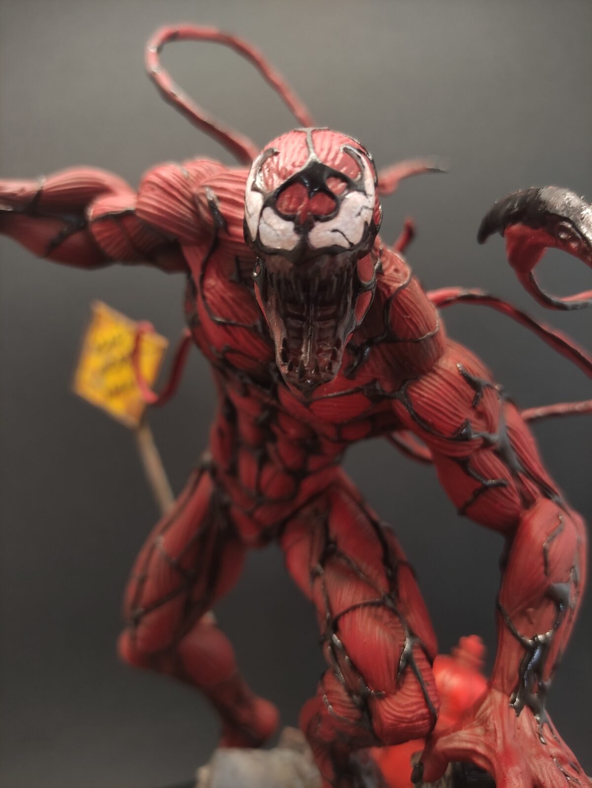 Close-up of Carnage's face with sharp teeth and wild eyes
