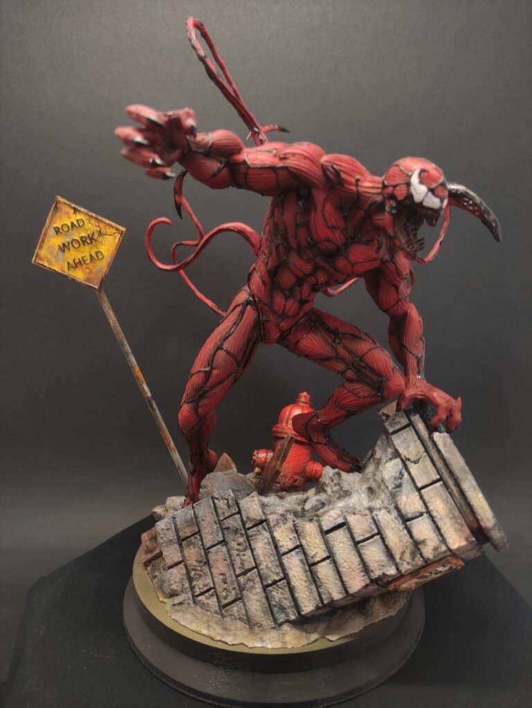 Full-body resin statue of Carnage in chaotic pose with tendrils spread