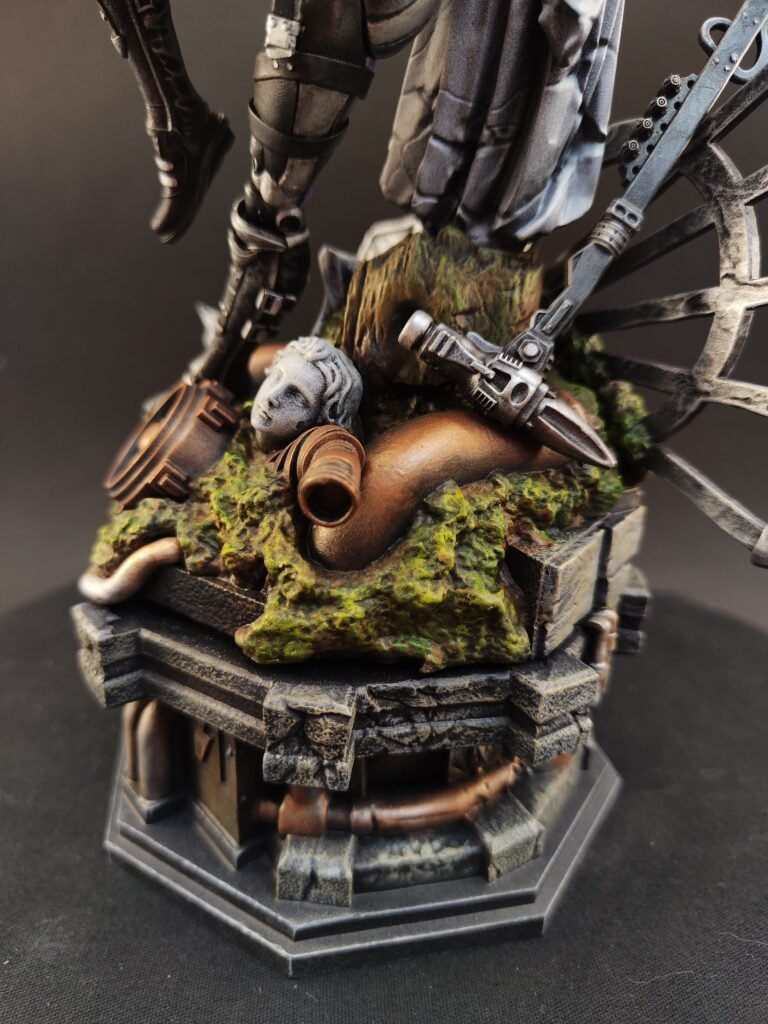 Close detail of mechanical arm and armor texture on painted sci-fi collectible
