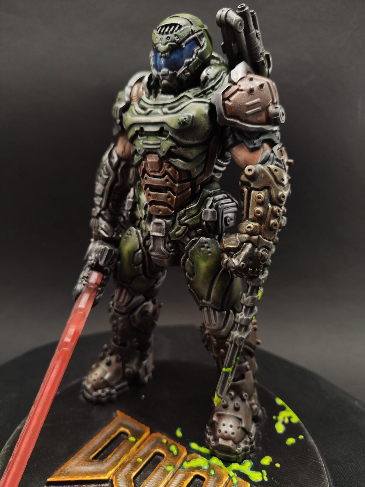 Side view of Slayer resin figure in power armor holding weapon with aggressive stance