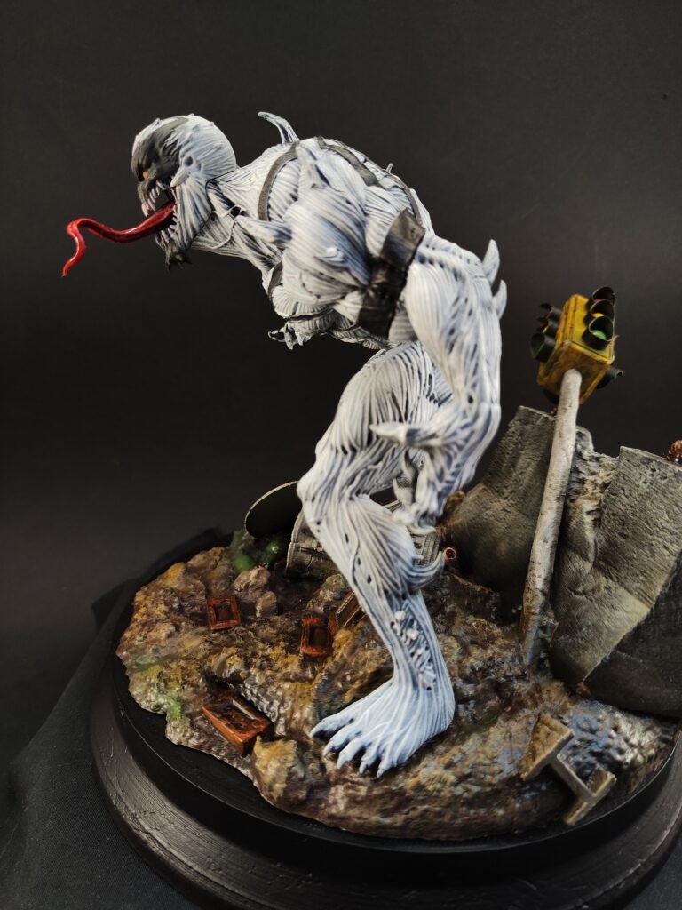 Left-side view of Anti-Venom resin figure showing muscle sculpt and black symbiote tendrils