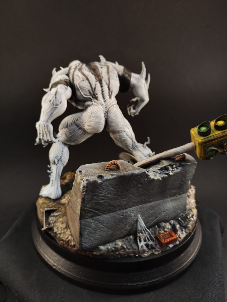 Back view of Anti-Venom figure highlighting spine texture and muscular detail
