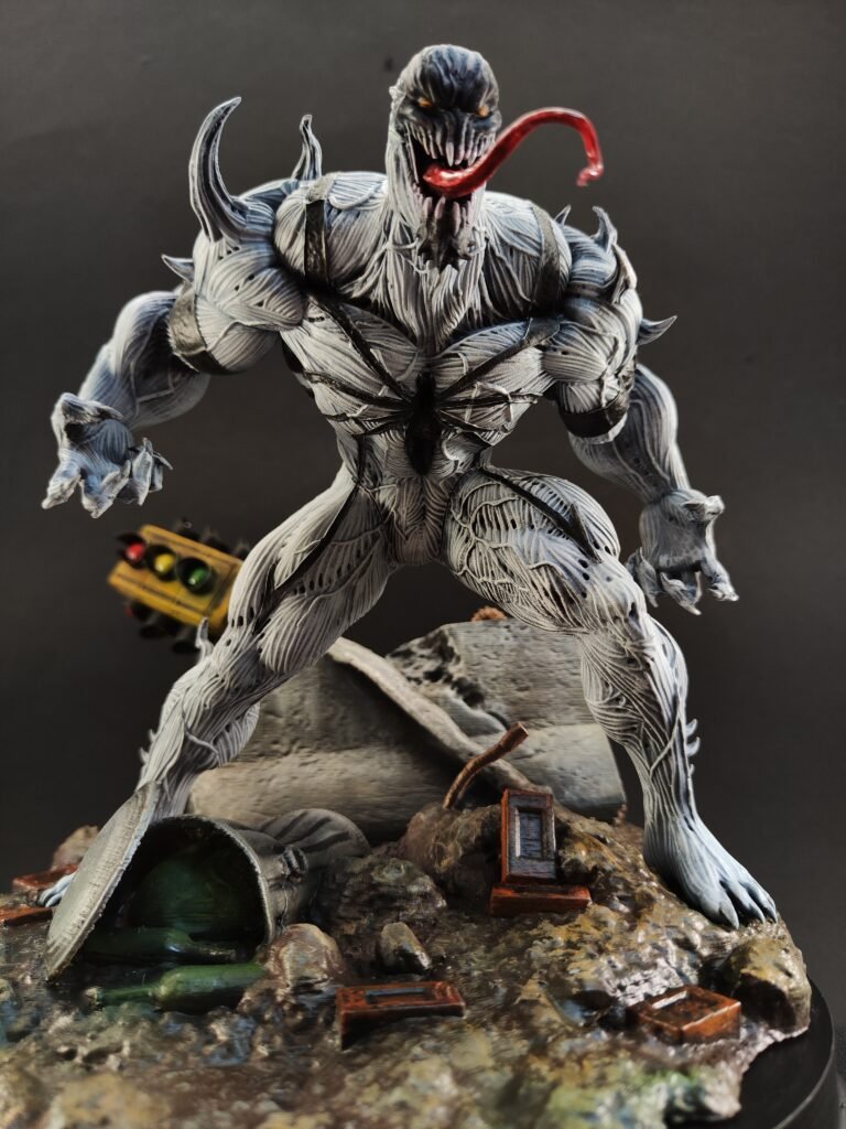 Detailed shot of Anti-Venom’s chest and claws in dynamic sculpted pose
