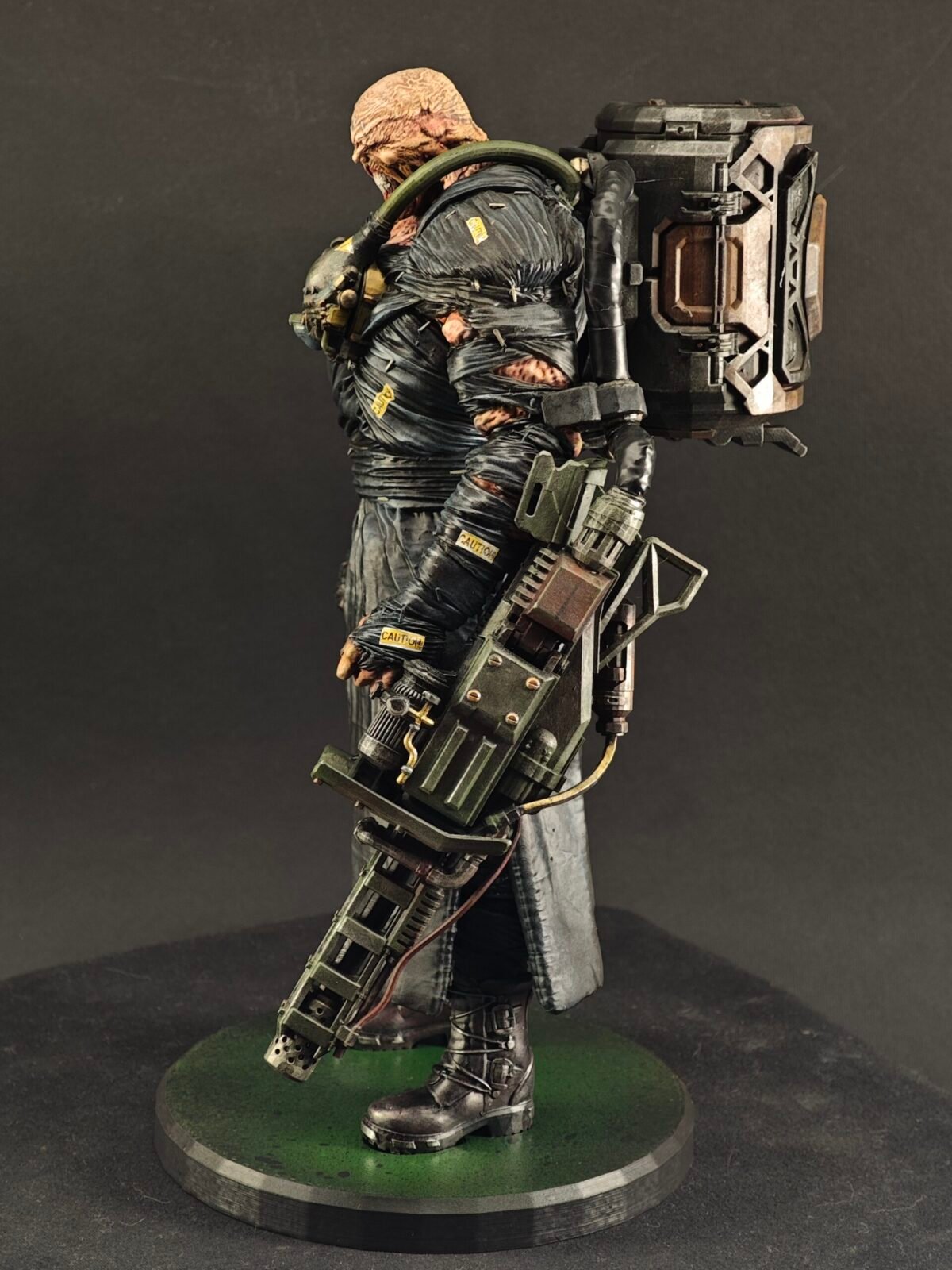 Left profile with clenched fist, sculpted veins, and airbrushed muscle detail