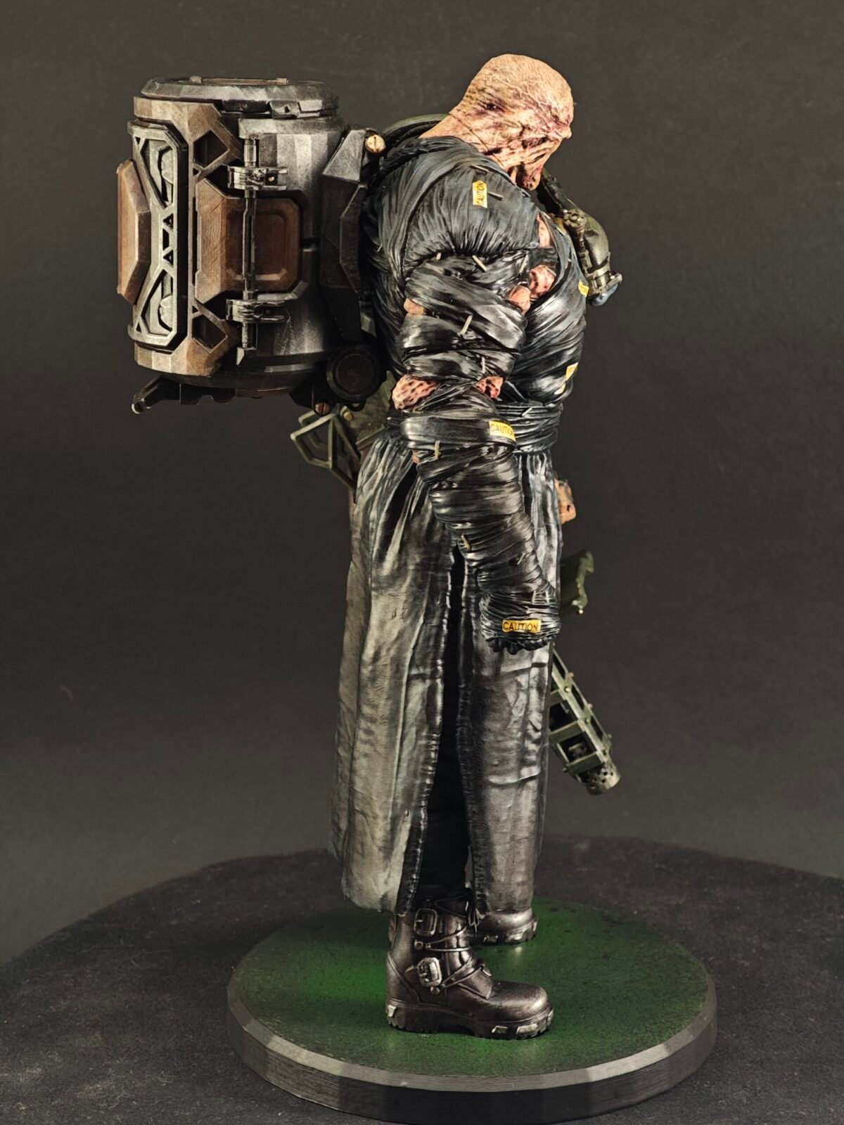 Right-side pose with weapon raised and mouth open in threatening snarl