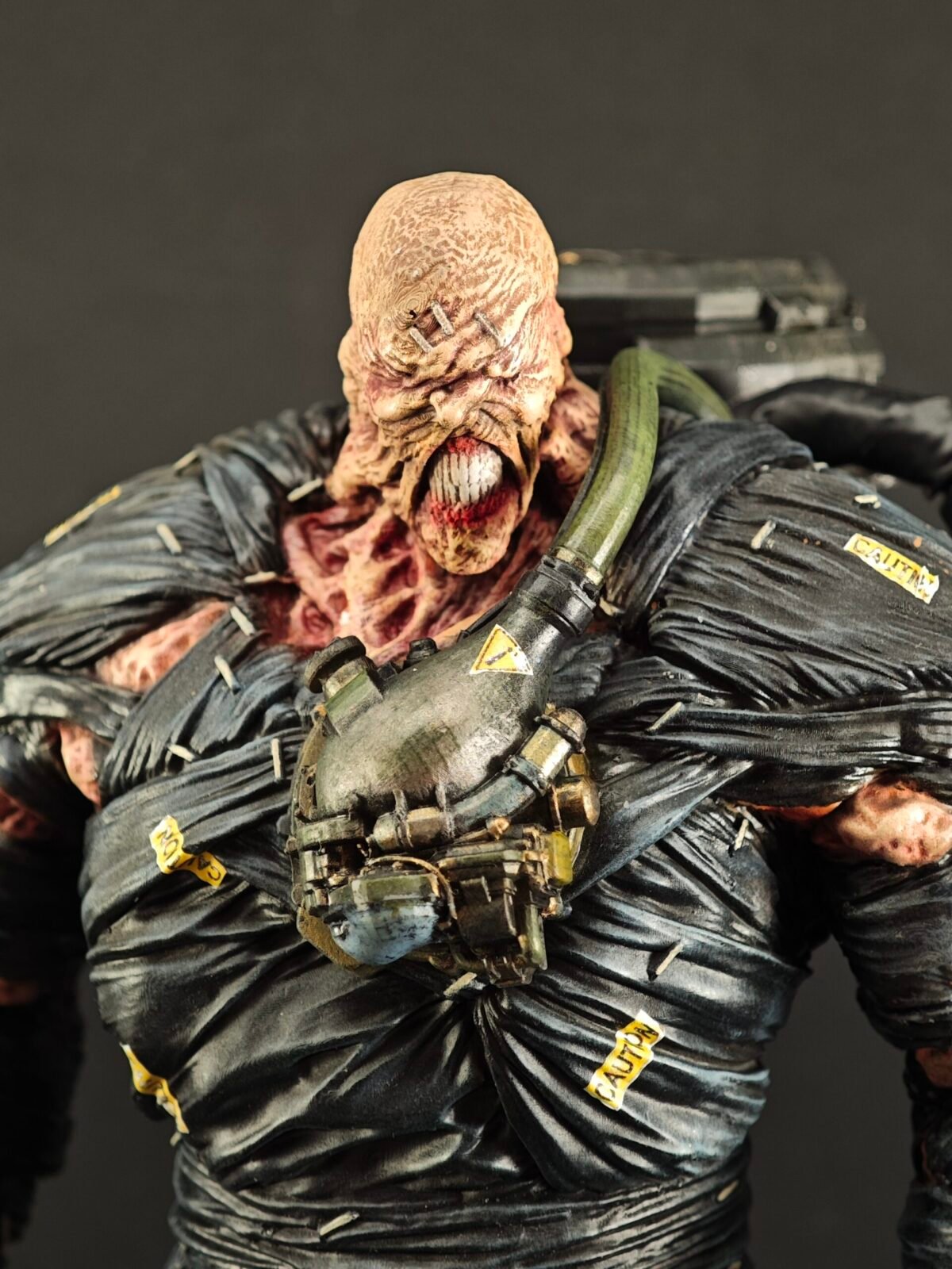 Three-quarter angle showing Nemesis mid-step on textured resin base