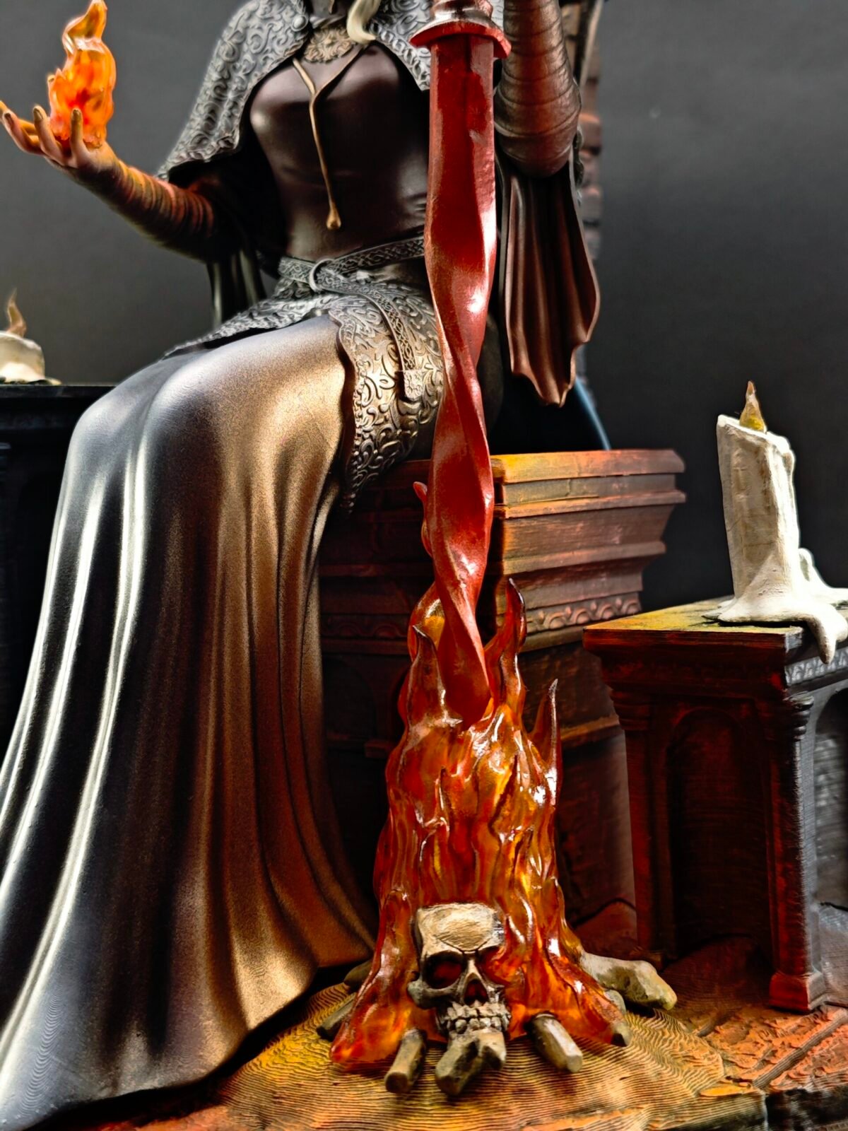 Three-quarter side view with Fire Keeper gazing into sculpted flame