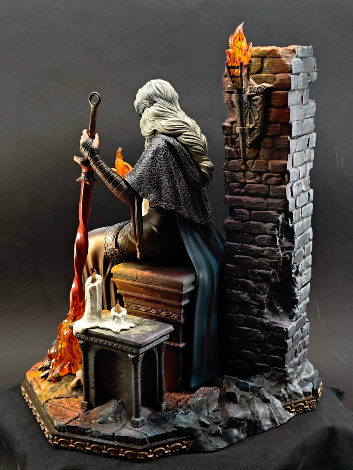 Side shot of Fire Keeper with glowing paint effect around flame