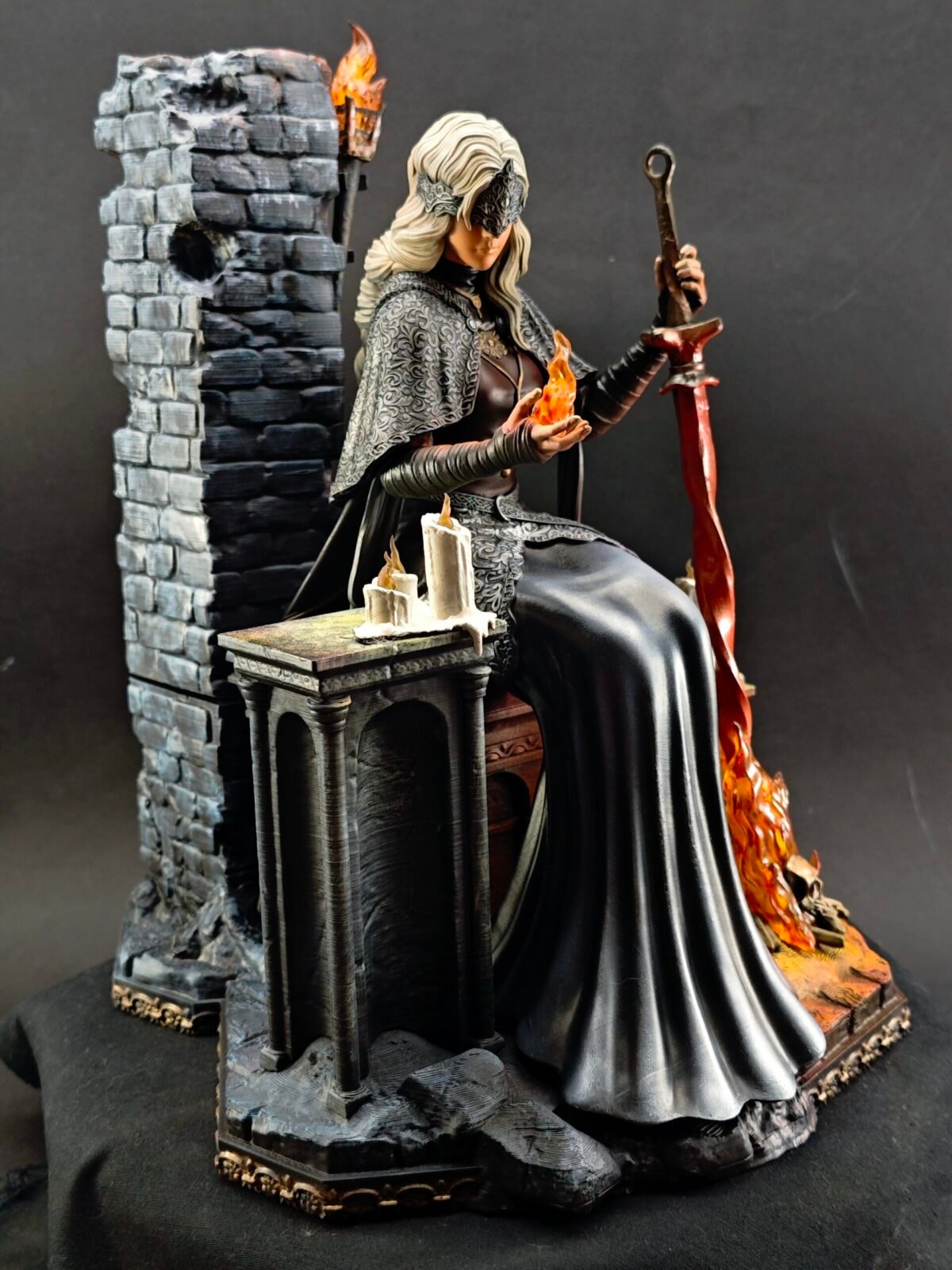 Angled front view with Fire Keeper standing over illuminated fire base