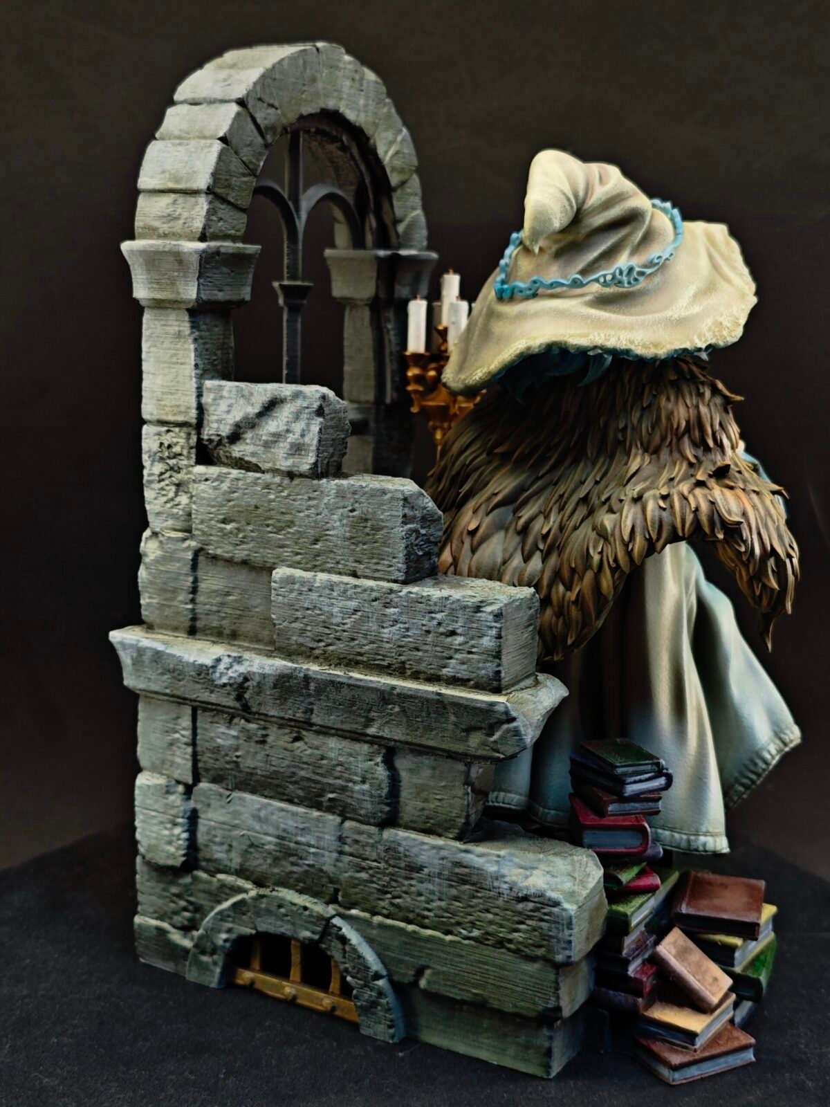 Three-quarter angle with hat shadowing face and arm posed outward