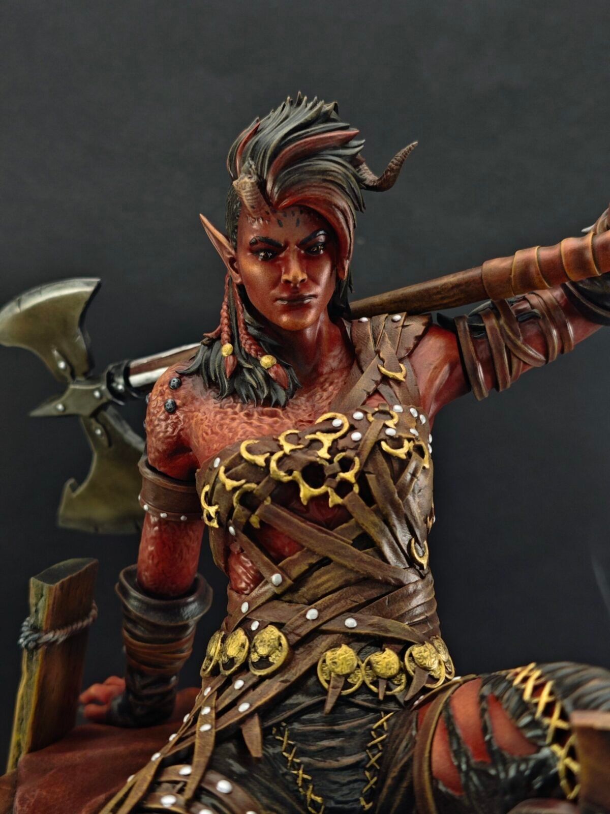 Angled view showing hair motion, armor layers, and intense expression