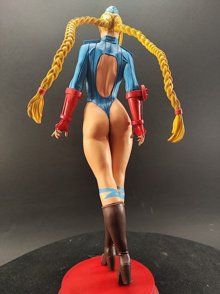 Rear angle showing sculpted leotard and hair flow