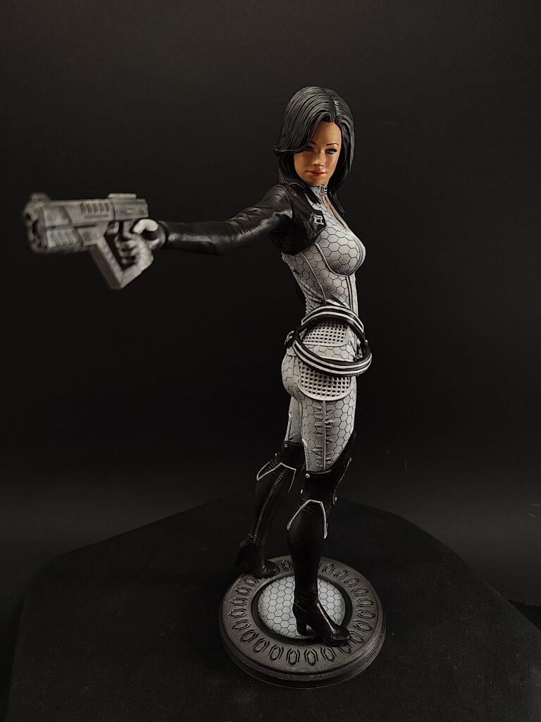 Full-body view of Miranda standing tall in tactical stance on display base
