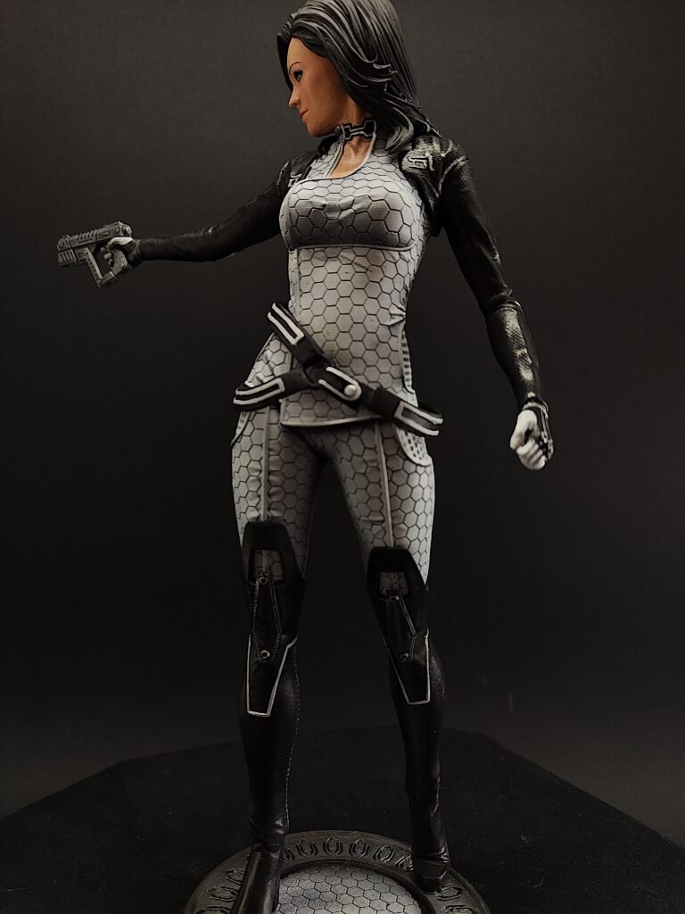 Left-side profile with arm raised and airbrushed armor reflecting light