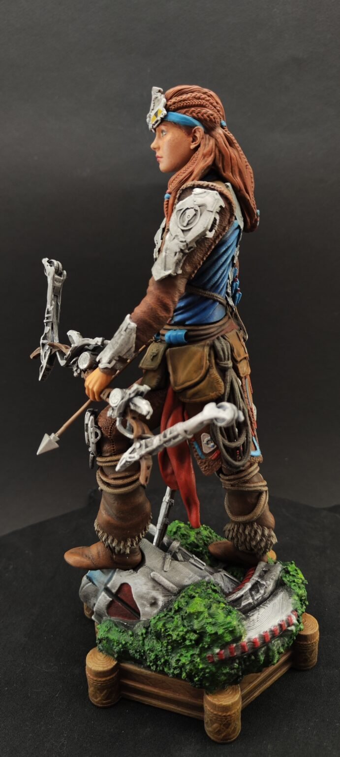 Left profile of figure showing stance and calm expression