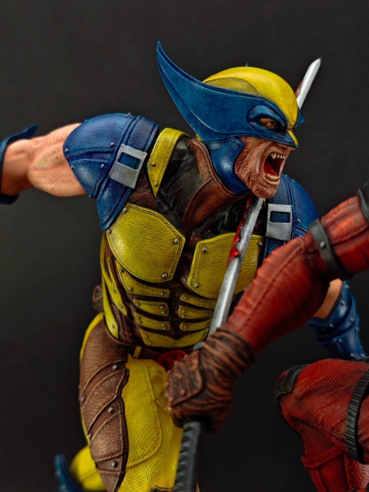 Close-up of snarling expression on clawed warrior with raised arm in attack