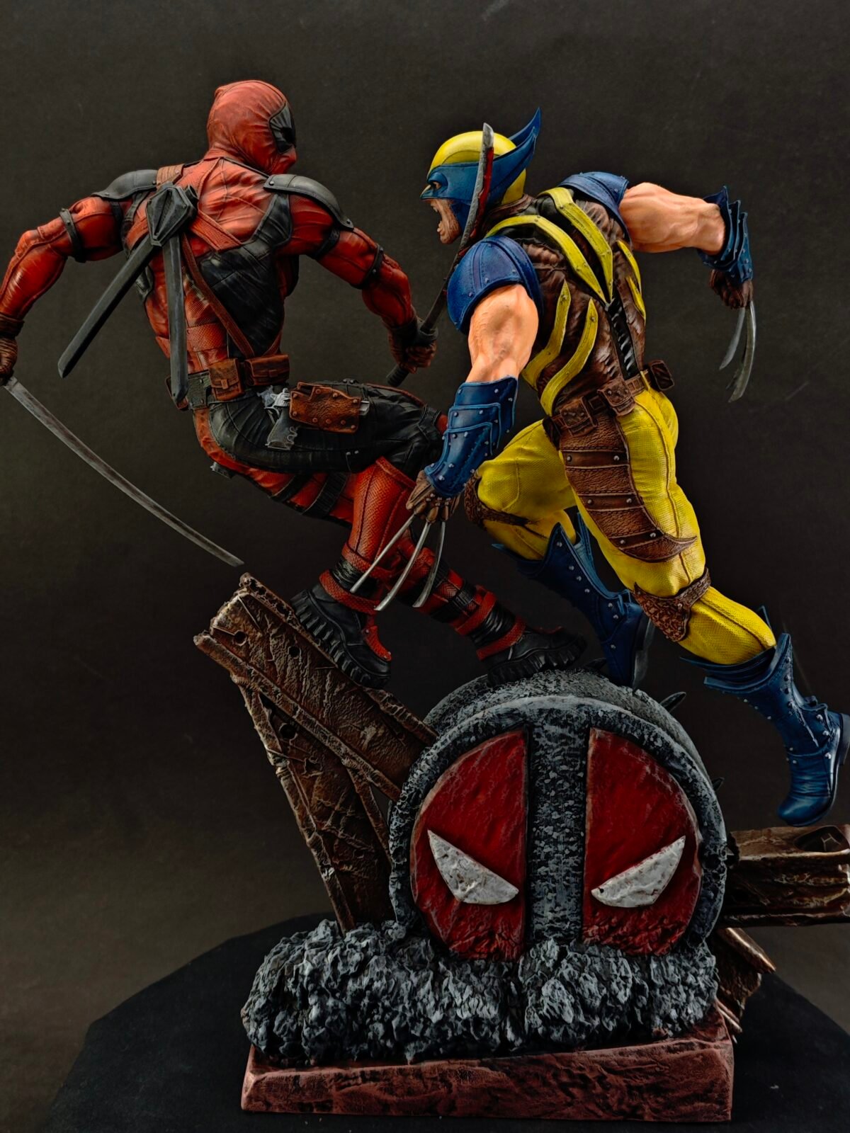 Stylized battle diorama featuring two comic-inspired characters in intense standoff