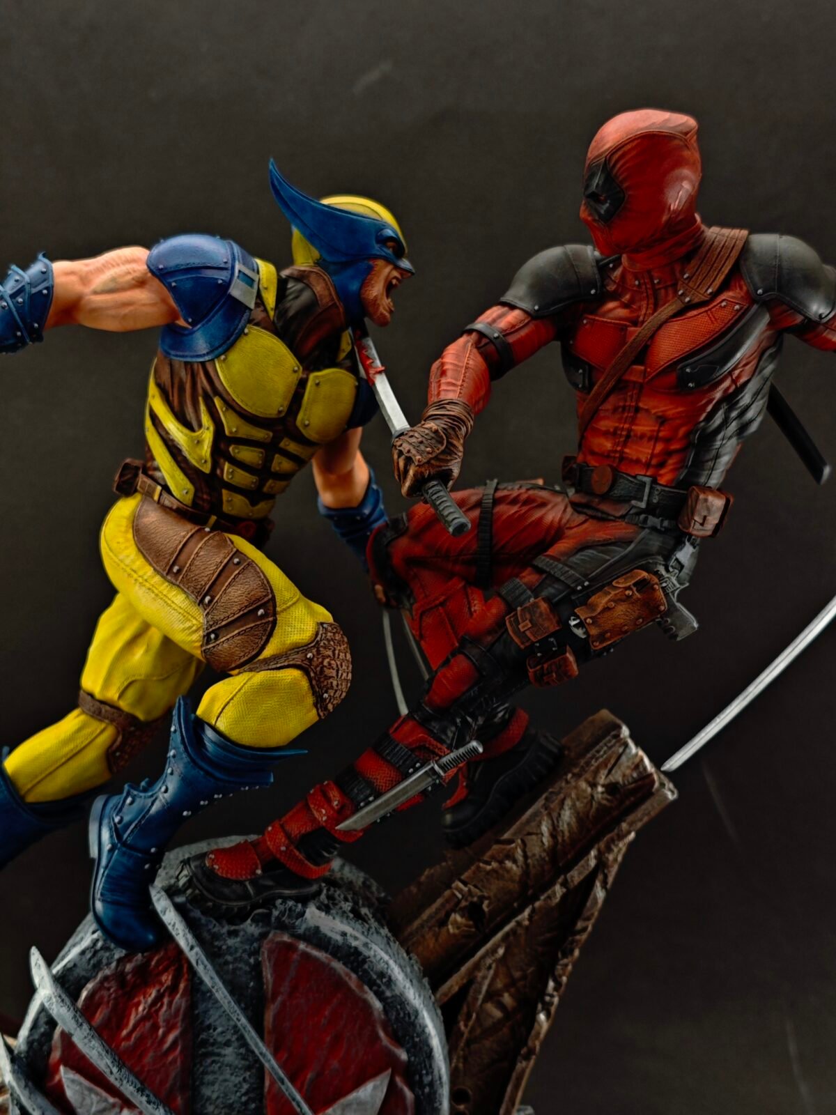 Detailed shot of hand-painted weapon effects and damaged costume elements