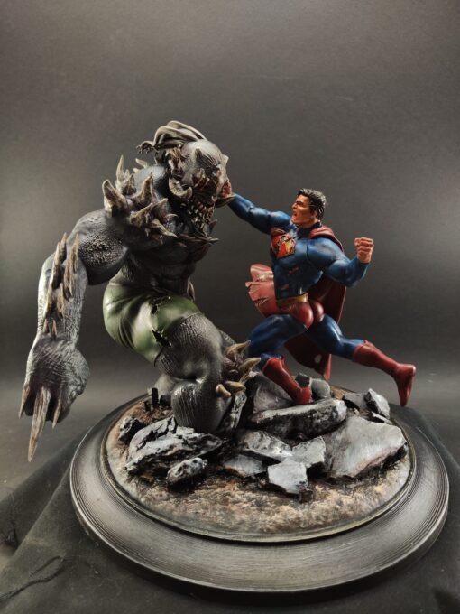 Superman figure in battle stance with Doomsday
